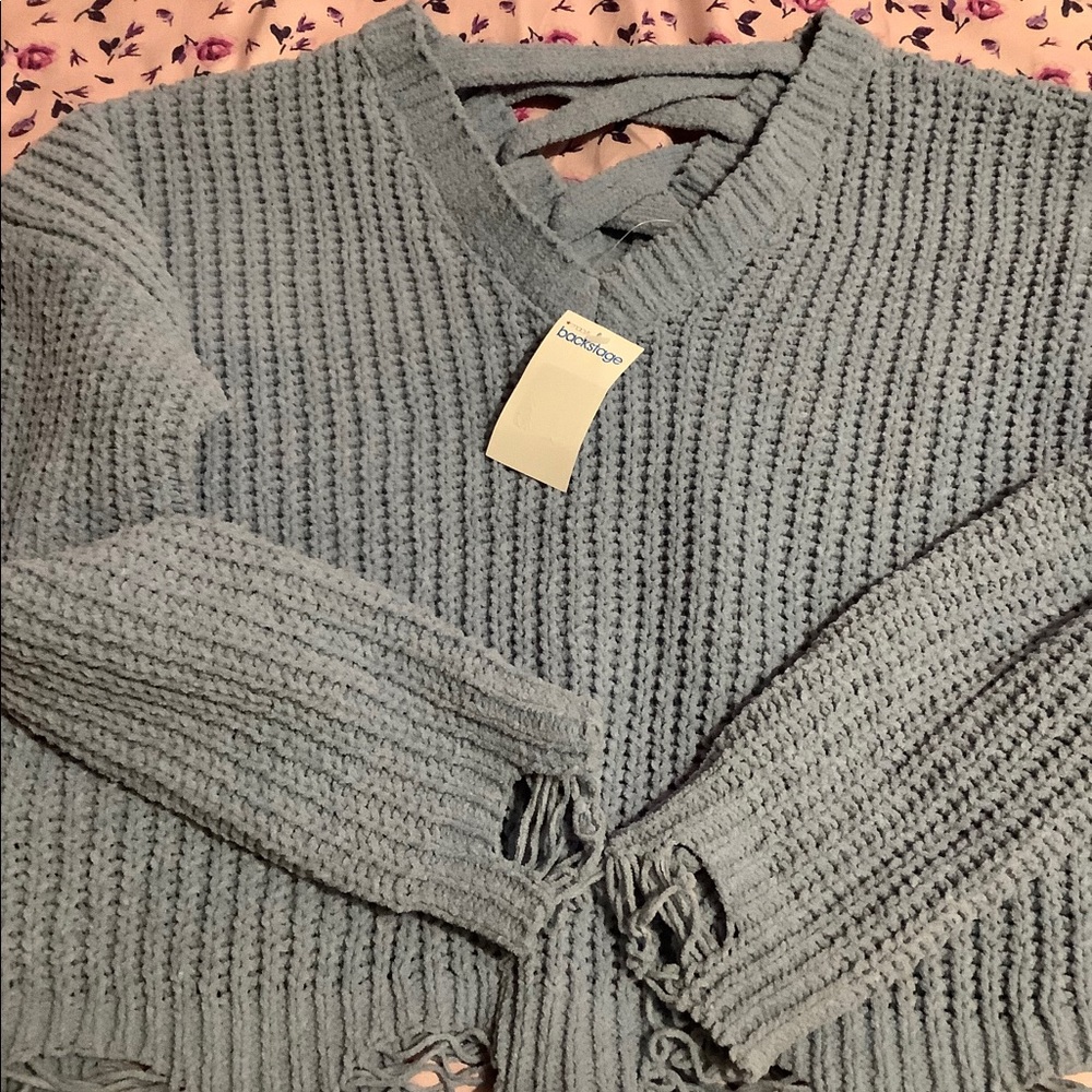 Light blue distressed sweater